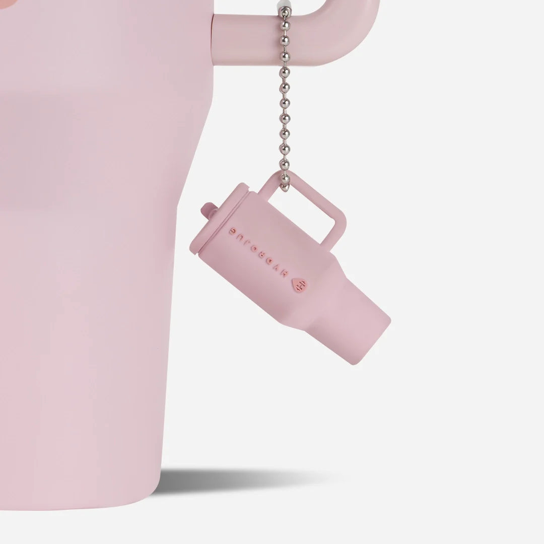 traveler-keychain-x0 Web-TravelerKeychainPhotos-PinkSand2.webp